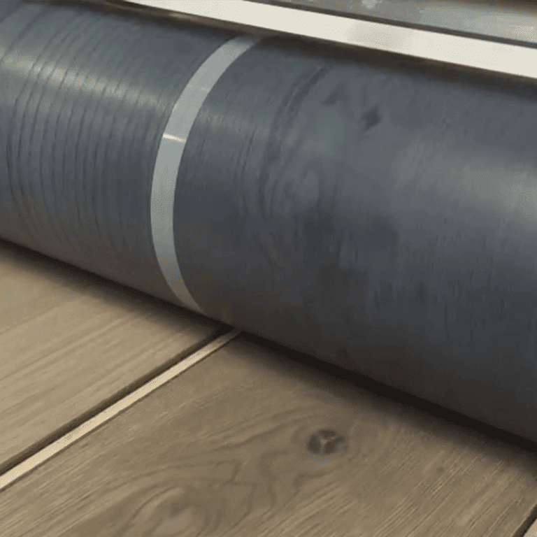 Industrial roller coater close up working